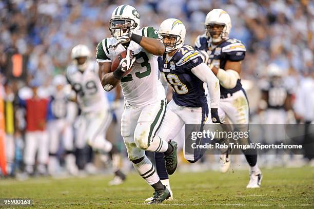 Shonn Greene of the New York Jets runs for a touchdown in the fourth quarter against the San Diego Chargers during AFC Divisional Playoff Game at...