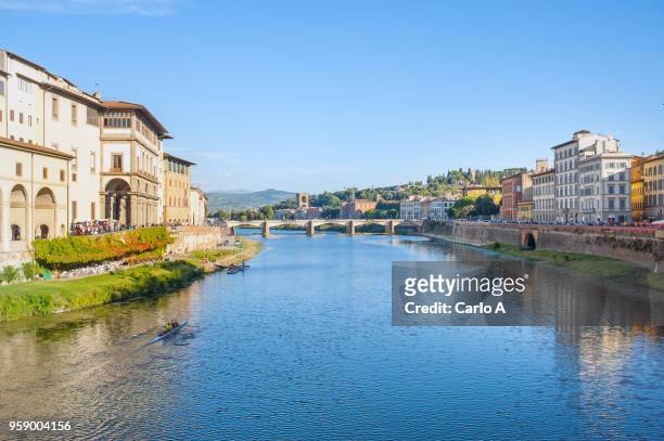 view of florence with river - river arno stock pictures, royalty-free photos & images
