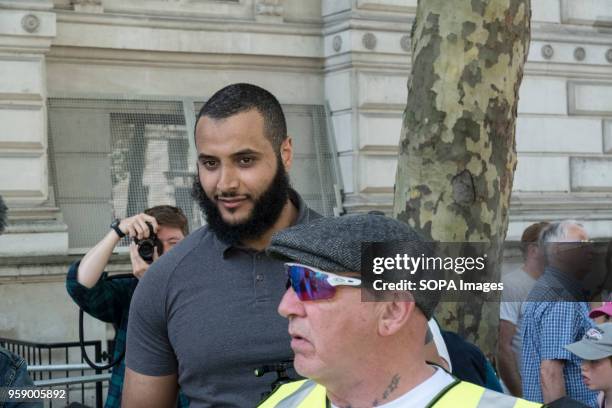 Mohammed Hijab smiles as he approaches the Day for Freedom rally in Whitehall. Mohammed Hijab is a controversial figure in the UK and is criticised...