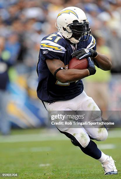 LaDainian Tomlinson of the San Diego Chargers rushes against the New York Jets during AFC Divisional Playoff Game at Qualcomm Stadium on January 17,...