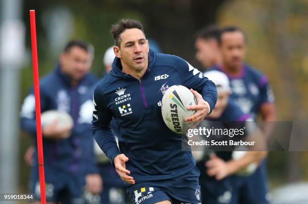Billy Slater of the Melbourne Storm runs with the ball during a Melbourne Storm NRL media session at Gosch's Paddock on May 16, 2018 in Melbourne,...