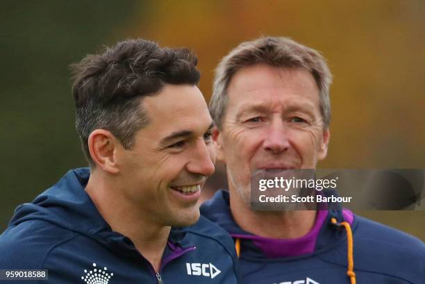 Billy Slater of the Melbourne Storm and Storm coach Craig Bellamy talk during a Melbourne Storm NRL media session at Gosch's Paddock on May 16, 2018...