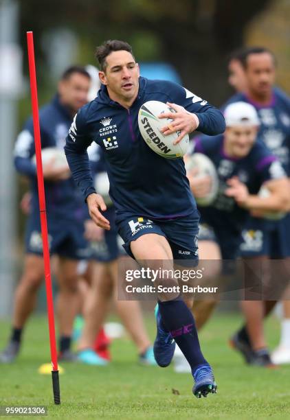 Billy Slater of the Melbourne Storm runs with the ball during a Melbourne Storm NRL media session at Gosch's Paddock on May 16, 2018 in Melbourne,...