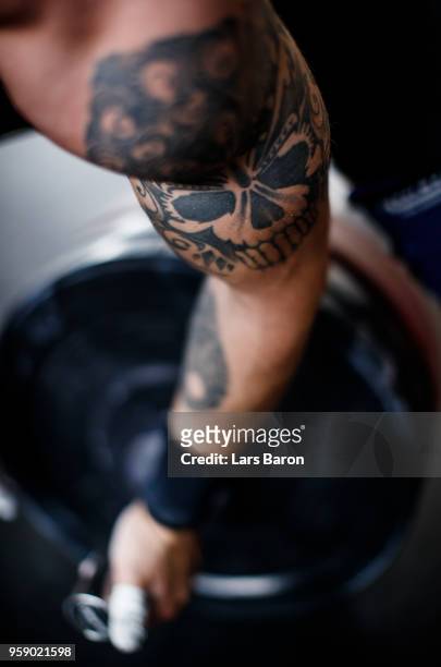 Tattoo is seen on Kevin Winkens of gym Vitus arm on the pegboard on April 24, 2018 in Moenchengladbach, Germany. Winkens qualifyed for the gym...