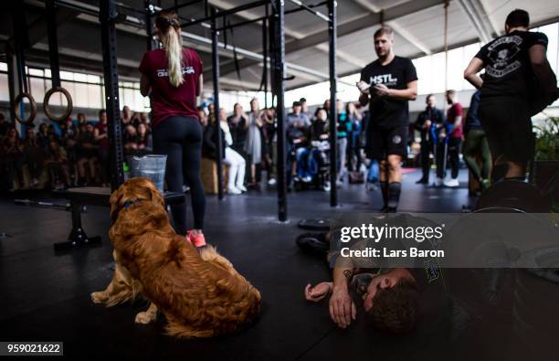 Kevin Winkens of gym Vitus lies on the floor after the gym Open Workout 18.05 on March 24, 2018 in Moenchengladbach, Germany. Winkens qualifyed for...