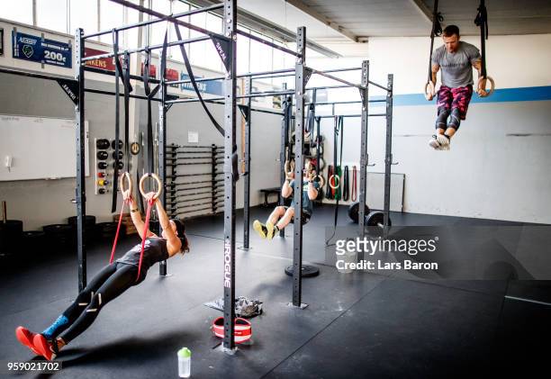 Kevin Winkens of Crossfit Vitus works on the rings during a training session on October 16, 2017 in Moenchengladbach, Germany. Winkens qualifyed for...