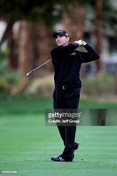 George McNeill hits his second shot from the ninth fairway during the first round of the Bob Hope Classic at the La Quinta Country Club on January...