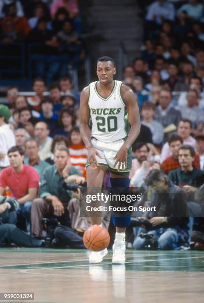 Jeff Grayer of the Milwaukee Bucks dribbles the ball up court during an NBA basketball game circa 1990 at the Bradley Center in Milwaukee, Wisconsin....