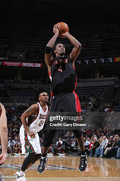 Chris Bosh of the Toronto Raptors shoots a jumpshot against the Milwaukee Bucks on January 20, 2010 at the Bradley Center in Milwaukee, Wisconsin....