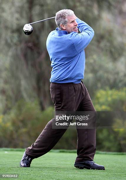 Ron Perlman hits a tee shot on the 11th hole during the first round of the Bob Hope Classic at the Silver Rock Resort on January 20, 2010 in La...