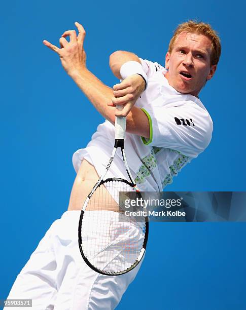Lukas Dlouhy of the Czech Republic plays a forehand in his first round doubles match with Leander Paes of India against Leos Friedl and David Skoch...