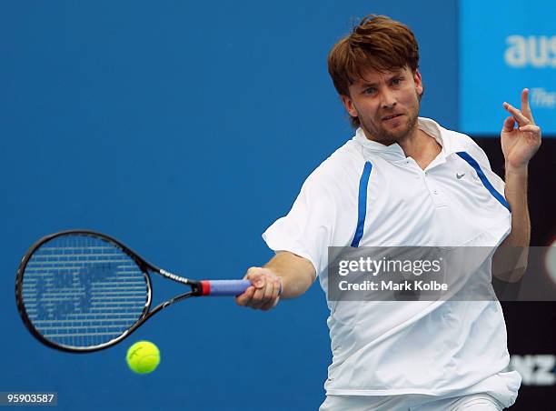 David Skoch of the Czech Republic plays a forehand in his first round doubles match with Leos Friedl of the Czech Republic against Lukas Dlouhy of...