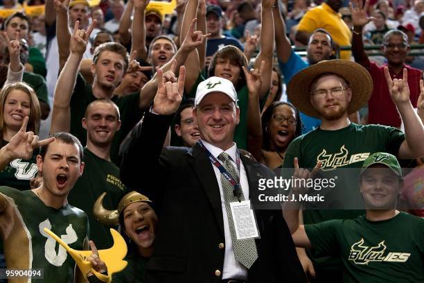 Newly hired football coach Skip Holtz of the South Florida Bulls enjoys the students during the game against the Rutgers Scarlet Knights at the...