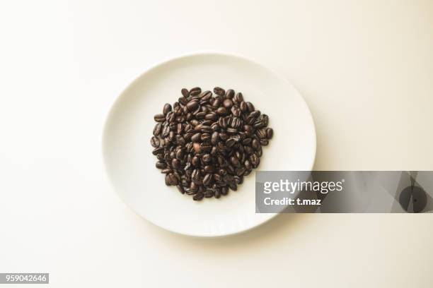 butter coffee diet. bulletproof coffee. high quality coffee beans - t maz stock pictures, royalty-free photos & images