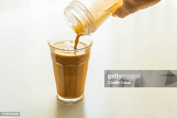 butter coffee diet. bulletproof coffee.creamy bubble. - t maz stock pictures, royalty-free photos & images