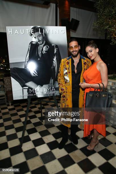 Maluma and guest attend the Haute Living Celebrates Maluma with JetSmarter and Ciroc at The Highlight Room at the Dream Hollywood on May 15, 2018 in...