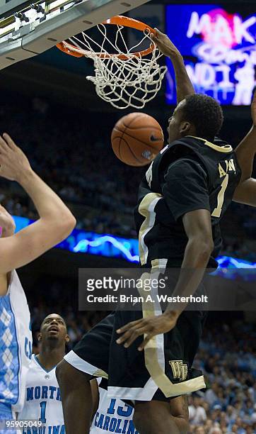 Al-Farouq Aminu of the Wake Forest Demon Deacons finishes off a slam dunk during second half action against the North Carolina Tar Heels on January...