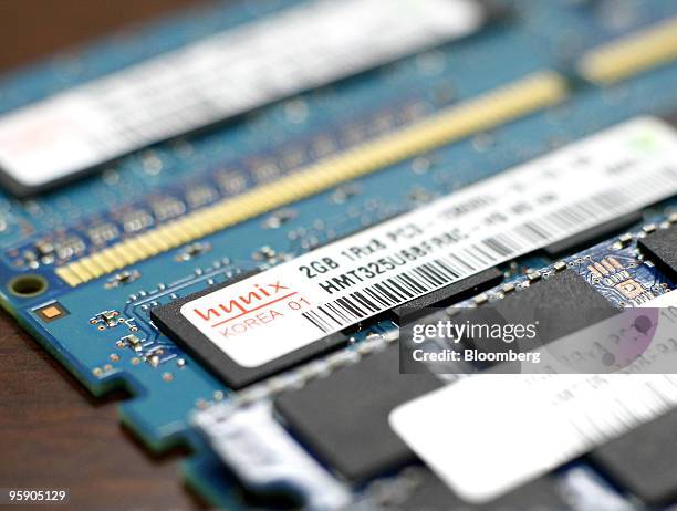 Hynix Semiconductor Inc. 44nm 2GB Double-Data-Rate modules with memory chips are arranged for a photograph at the company's offices, in Seoul, South...