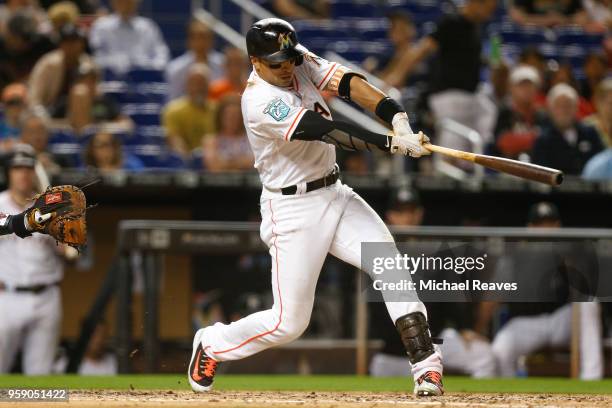 Martin Prado of the Miami Marlins at bat against the Atlanta Braves at Marlins Park on May 10, 2018 in Miami, Florida.