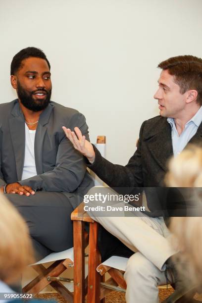 John David Washington and Topher Grace at the HFPA Lounge at Nikki Beach on May 16, 2018 in Cannes, France.