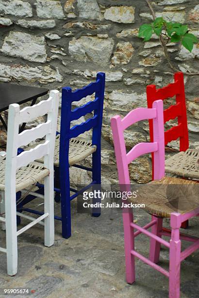 greek restaurant and chairs - julia jackson stock pictures, royalty-free photos & images