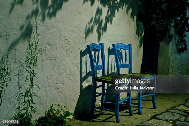 greek chairs  - julia jackson stock pictures, royalty-free photos & images