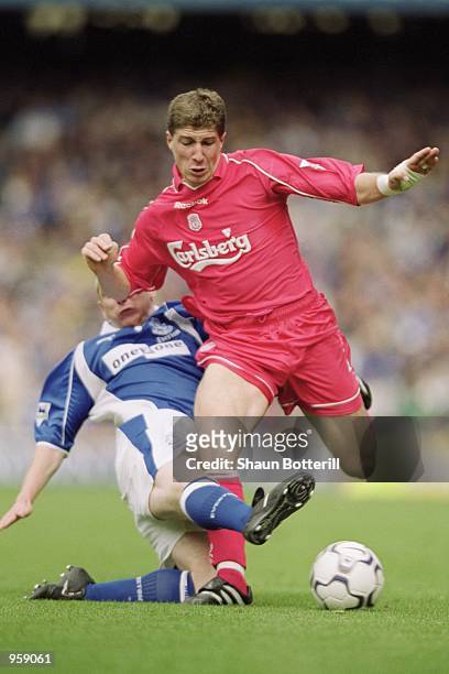 Gregory Vignal of Liverpool takes the ball past Tony Hibbert of Everton during the FA Barclaycard Premiership match played at Goodison Park, in...