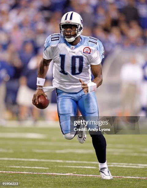 Vince Young of the Tennessee Titans runs with the ball during the NFL game against the Indianapolis Colts at Lucas Oil Stadium on December 6, 2009 in...