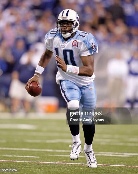 Vince Young of the Tennessee Titans runs with the ball during the NFL game against the Indianapolis Colts at Lucas Oil Stadium on December 6, 2009 in...