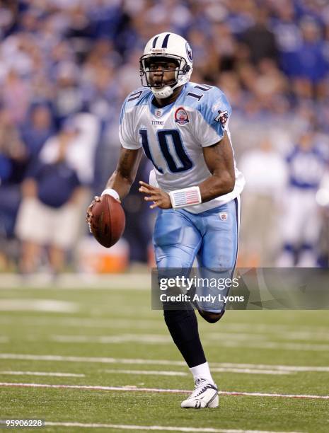 Vince Young of the Tennessee Titans runs with the ball during the NFL game against the Indianapolis Colts at Lucas Oil Stadium on December 6, 2009 in...