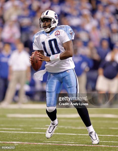 Vince Young of the Tennessee Titans runs with the ball during the NFL game against the Indianapolis Colts at Lucas Oil Stadium on December 6, 2009 in...