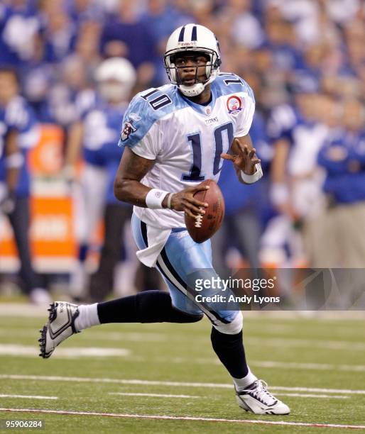 Vince Young of the Tennessee Titans runs with the ball during the NFL game against the Indianapolis Colts at Lucas Oil Stadium on December 6, 2009 in...