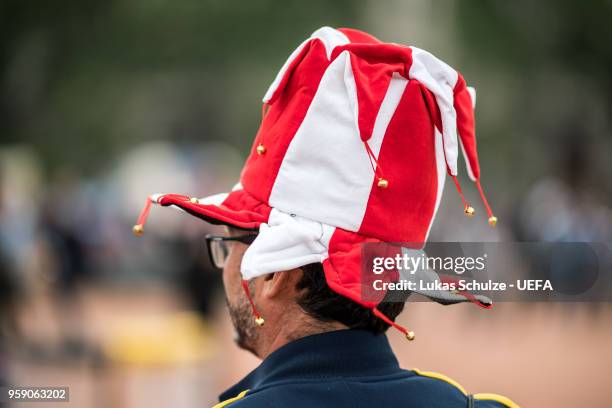 Fan of Madrid wears a head with the colors his team at the Fan Zone ahead of the UEFA Europa League Final between Olympique de Marseille and Club...