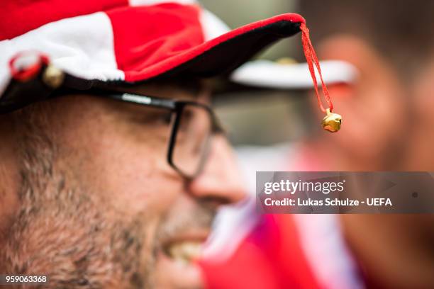 Fan of Madrid wears a head with the colors his team at the Fan Zone ahead of the UEFA Europa League Final between Olympique de Marseille and Club...