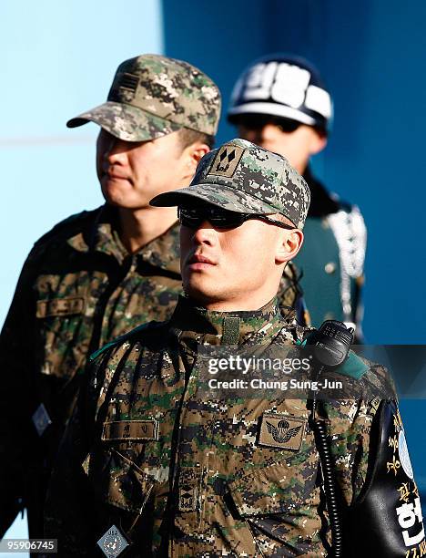 South Korean soldiers stands guard near the South side of the border in the village of Panmunjom between South and North Korea in the demilitarized...