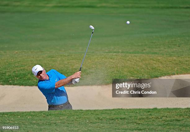 Curtis Strange hits from a bunker on during practice for the Mitsubishi Electric Championship at Hualalai held at Hualalai Golf Club on January 20,...