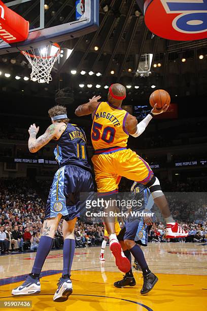 Corey Maggette of the Golden State Warriors scores against Chris Andersen of the Denver Nuggets on January 20, 2010 at Oracle Arena in Oakland,...