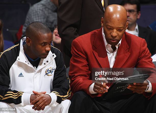 Assistant coach Sam Cassell instructs Earl Boykins of the Washington Wizards during the game against the Detroit Pistons on January 12, 2010 at the...