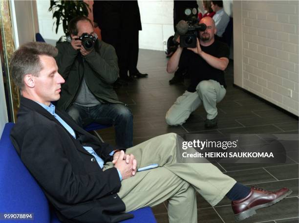 The former coach of the Finnish cross-country ski team, Kari-Pekka Kyroe ,waits 15 June 2004 outside the courtroom for the start of his trial on...