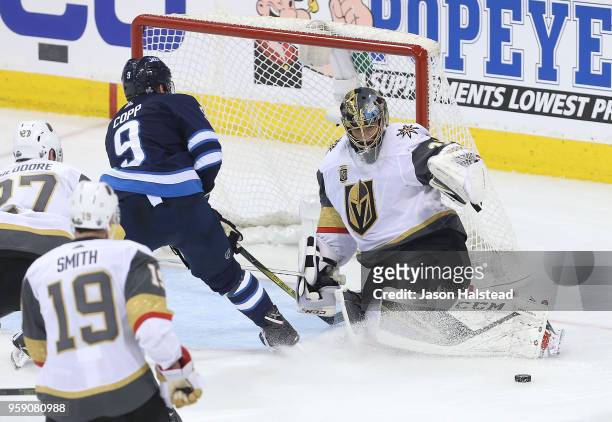 Marc-Andre Fleury of the Vegas Golden Knights makes a save off Andrew Copp of the Winnipeg Jets in Game Two of the Western Conference Finals during...