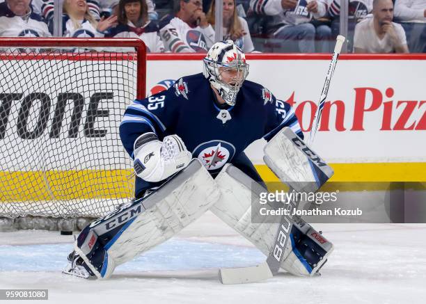 Goaltender Steve Mason of the Winnipeg Jets takes part in the pre-game warm up prior to NHL action against the Vegas Golden Knights in Game One of...