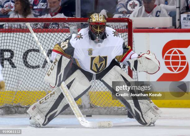 Goaltender Malcolm Subban of the Vegas Golden Knights takes part in the pre-game warm up prior to NHL action against the Winnipeg Jets in Game One of...