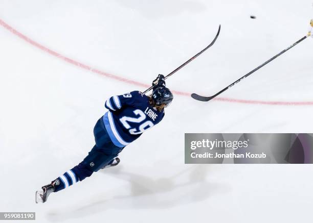 Patrik Laine of the Winnipeg Jets takes a shot on goal during second period action against the Vegas Golden Knights in Game One of the Western...