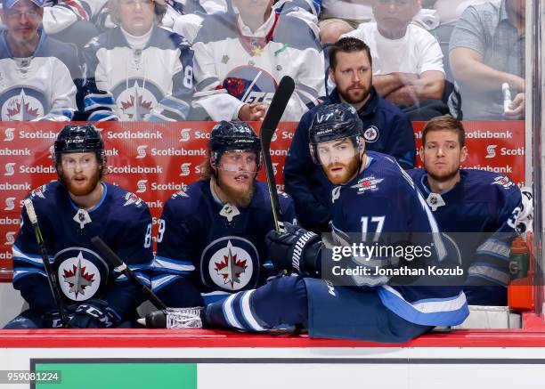 Adam Lowry of the Winnipeg Jets waits for a line change during second period action against the Vegas Golden Knights in Game One of the Western...