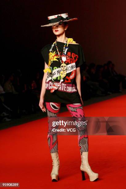 Model showcases designs by Andreas Kronthaler during the Vivienne Westwood Spring-Summer 2010 collection on the catwalk during the Hong Kong Fashion...