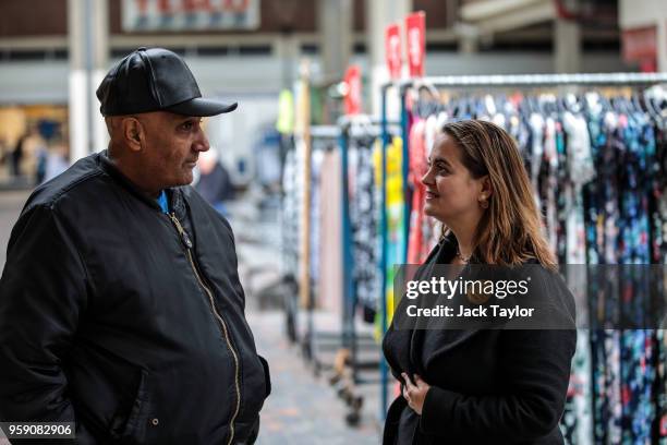 Liberal Democrat Parliamentary candidate for Lewisham East, Lucy Salek speaks to a man in Catford Market as the party launch their Lewisham East...