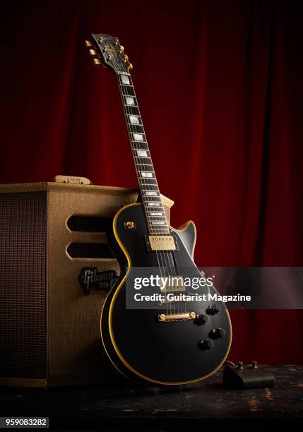 Gibson True Historic 1957 Les Paul Custom "Black Beauty" electric guitar and a vintage Gibson GA-79RVT amplifier, taken on January 13, 2017.