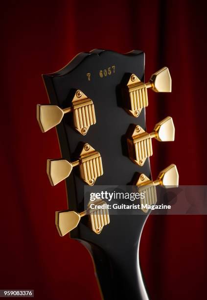 Detail of the Kluson tuners on a Gibson True Historic 1957 Les Paul Custom "Black Beauty" electric guitar, taken on January 13, 2017.