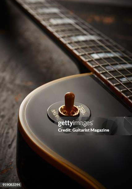 Detail of the rhythm/treble switch on a Gibson True Historic 1957 Les Paul Custom "Black Beauty" electric guitar, taken on January 13, 2017.