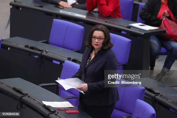 Andrea Nahles, leader of the Social Democratic Party , holds documents ahead of a budget policy plan debate in the lower-house of the Bundestag in...